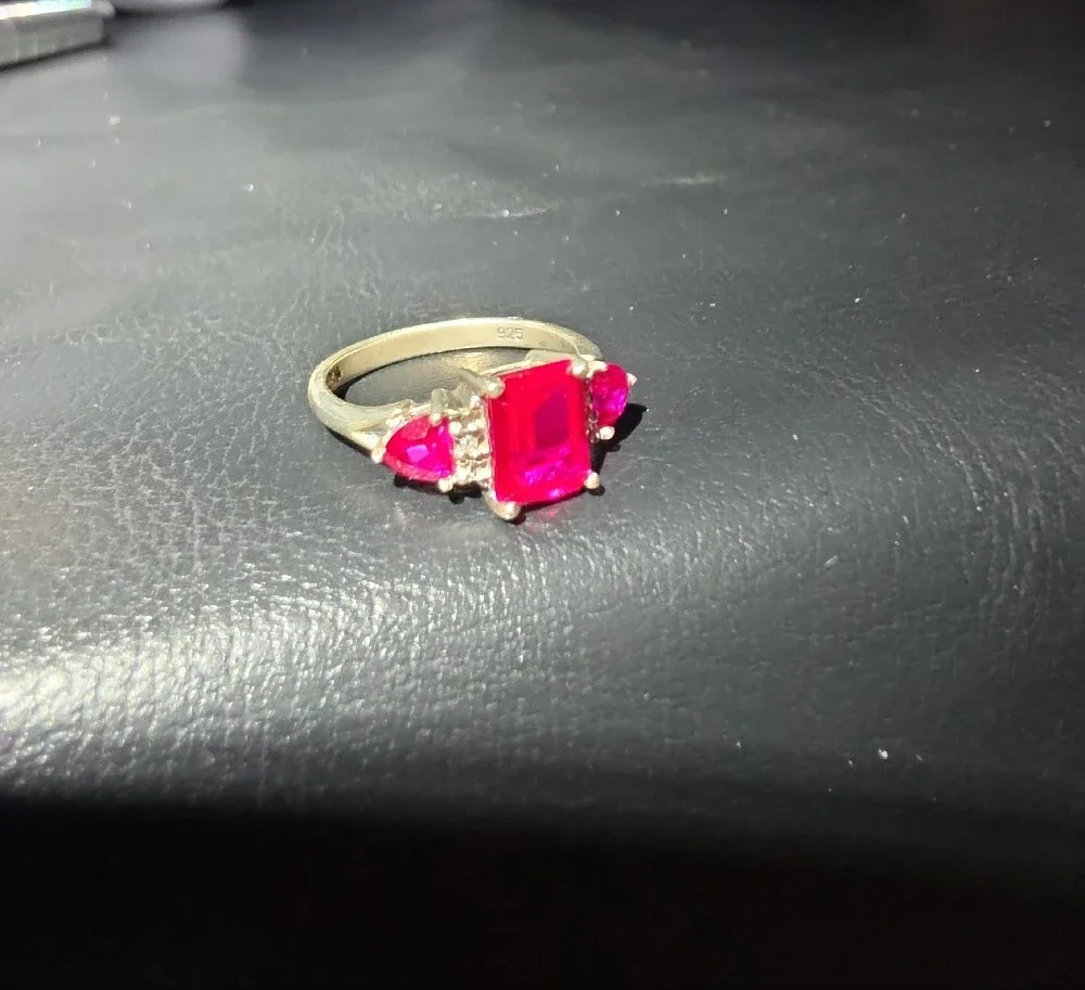 925 And Three-Stone Ruby Ring